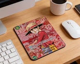Luffy anime character mouse pad on wooden office desk with white wireless mouse coffee mug and modern computer setup