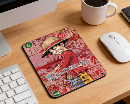 Luffy anime character mouse pad on wooden office desk with white wireless mouse coffee mug and modern computer setup