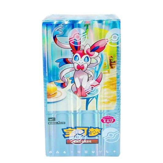 A boxed toy or game package featuring a blue and white cartoon character on the front, with Chinese text and a Pokéball logo. A black text banner at the top reads, 'ORDERS WILL SHIP BY THE 1st WEEK OF AUGUST.