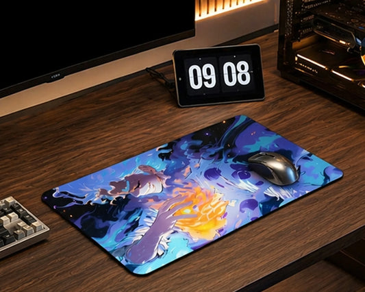 Extended anime desk mat with vibrant blue and purple energy artwork, gaming mouse, and clean wooden desk workspace
