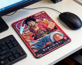 Anime Luffy themed mouse pad inspired by trading card artwork placed on clean white desk with monitor and mouse
