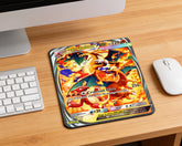 Mega Charizard Y EX Pokémon card style gaming mouse pad placed on modern wooden desk beside keyboard and mouse