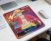 Monkey D. Luffy anime trading card style mouse pad with red background artwork on modern white computer desk