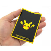 Official Pokémon Center card sleeves featuring Pikachu surrounded by yellow electric lightning bolts with a dark background by TCGVault.