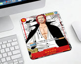One Piece Shanks trading card style mouse pad on clean white desktop setup with Apple keyboard and mouse