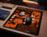 Son Goku Dragon Ball anime mouse pad with bold orange and black artwork on RGB gaming desk setup