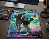 Umbreon V Pokémon card inspired mouse pad with colorful cosmic background placed beside gaming keyboard and wireless mouse