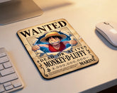 One Piece Monkey D. Luffy wanted poster style mouse pad on clean white desk beside wireless mouse and keyboard