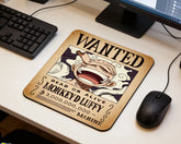 Monkey D. Luffy wanted poster anime mouse pad placed beside black keyboard and mouse on clean white desk