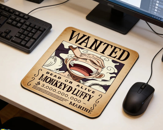 Monkey D. Luffy wanted poster anime mouse pad placed beside black keyboard and mouse on clean white desk