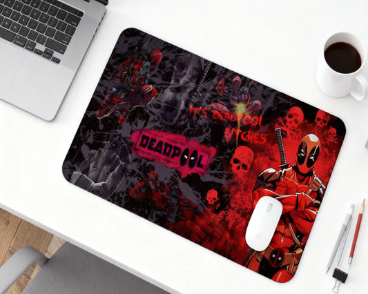 extended deadpool desk mat featuring comic character graphics and skull pattern on clean workspace with laptop and mouse