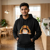 Front view of a black Kid Luffy anime hoodie featuring a young Monkey D. Luffy graphic, styled as premium streetwear by TCGVault.