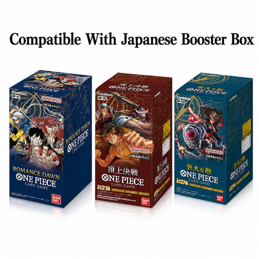 Three One Piece card game booster boxes shown side by side on a white background, with the text 'Compatible With Japanese Booster Box' above them. The boxes feature colorful anime artwork and branding for Romance Dawn and Grand War.