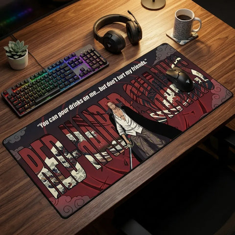 Anime extended mouse pad with Red Hair Shanks design on RGB gaming desk setup with mechanical keyboard, headphones, and coffee mug.