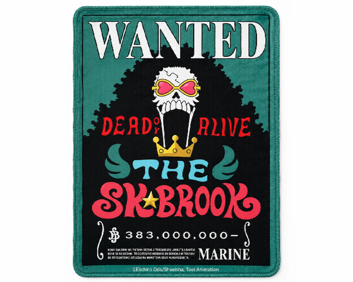 Brook One Piece gaming mouse pad featuring the Wanted Dead or Alive bounty poster, a skull with pink heart-shaped sunglasses, a golden crown, red and teal lettering, and a teal border.