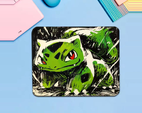 Bulbasaur Pokémon gaming mouse pad featuring a green Bulbasaur with red eyes, a large plant bulb on its back, cream highlights, and bold black sketch-style artwork.