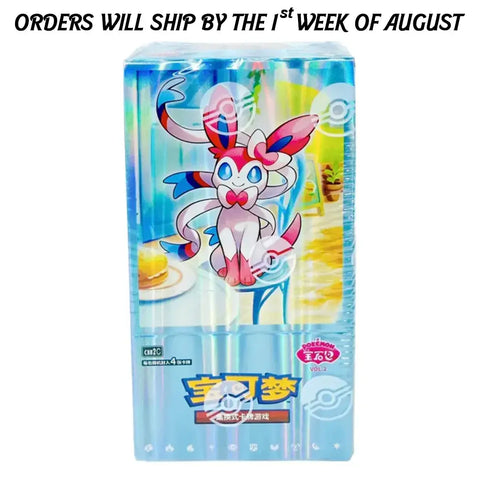 A boxed toy or game package featuring a blue and white cartoon character on the front, with Chinese text and a Pokéball logo. A black text banner at the top reads, 'ORDERS WILL SHIP BY THE 1st WEEK OF AUGUST.