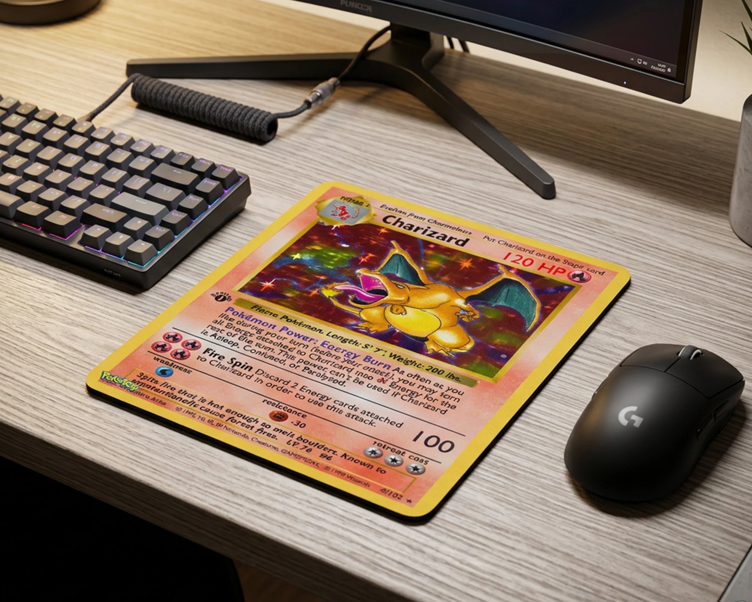 Classic Charizard Pokémon card mouse pad on wooden gaming desk with RGB mechanical keyboard and wireless gaming mouse