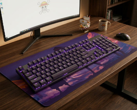 Close-up anime gaming desk setup with purple RGB mechanical keyboard, large illustrated desk mat, curved monitor, and coffee mug.