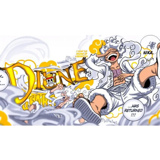 Close-up of One Piece Gear 5 Luffy desk mat design with bold ‘Dine’ text, clouds, and manga-style artwork in white and gold tones