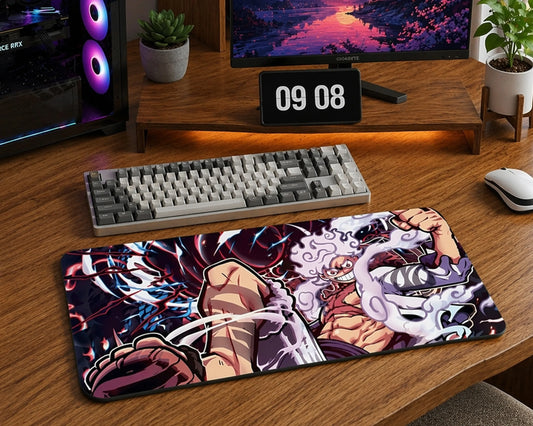 Gaming desk setup with One Piece Gear 5 Luffy mouse pad, mechanical keyboard, RGB PC, and warm wooden workspace