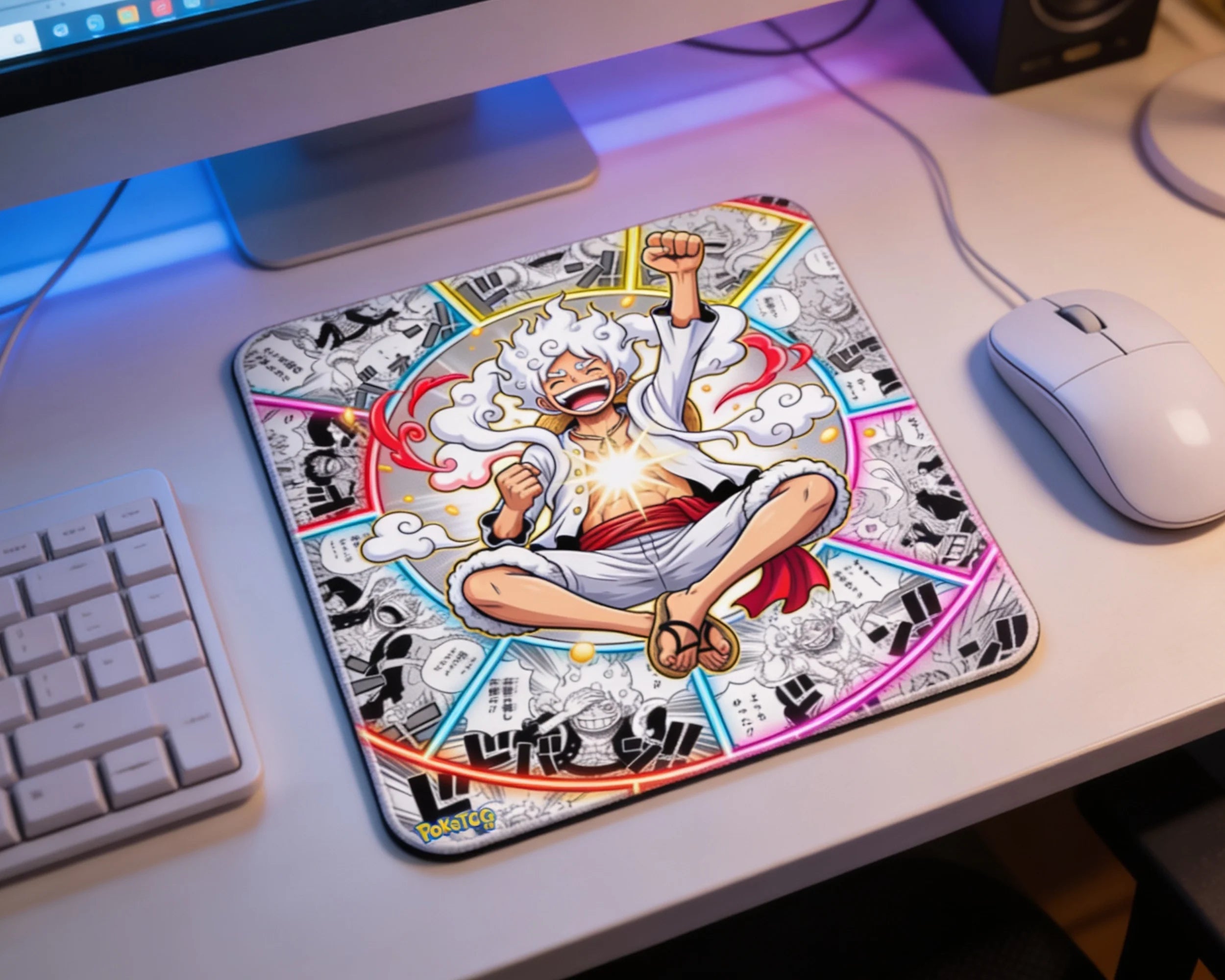 Minimalist desktop setup with Gear 5 Luffy manga art mouse pad glowing under soft blue and pink ambient lighting