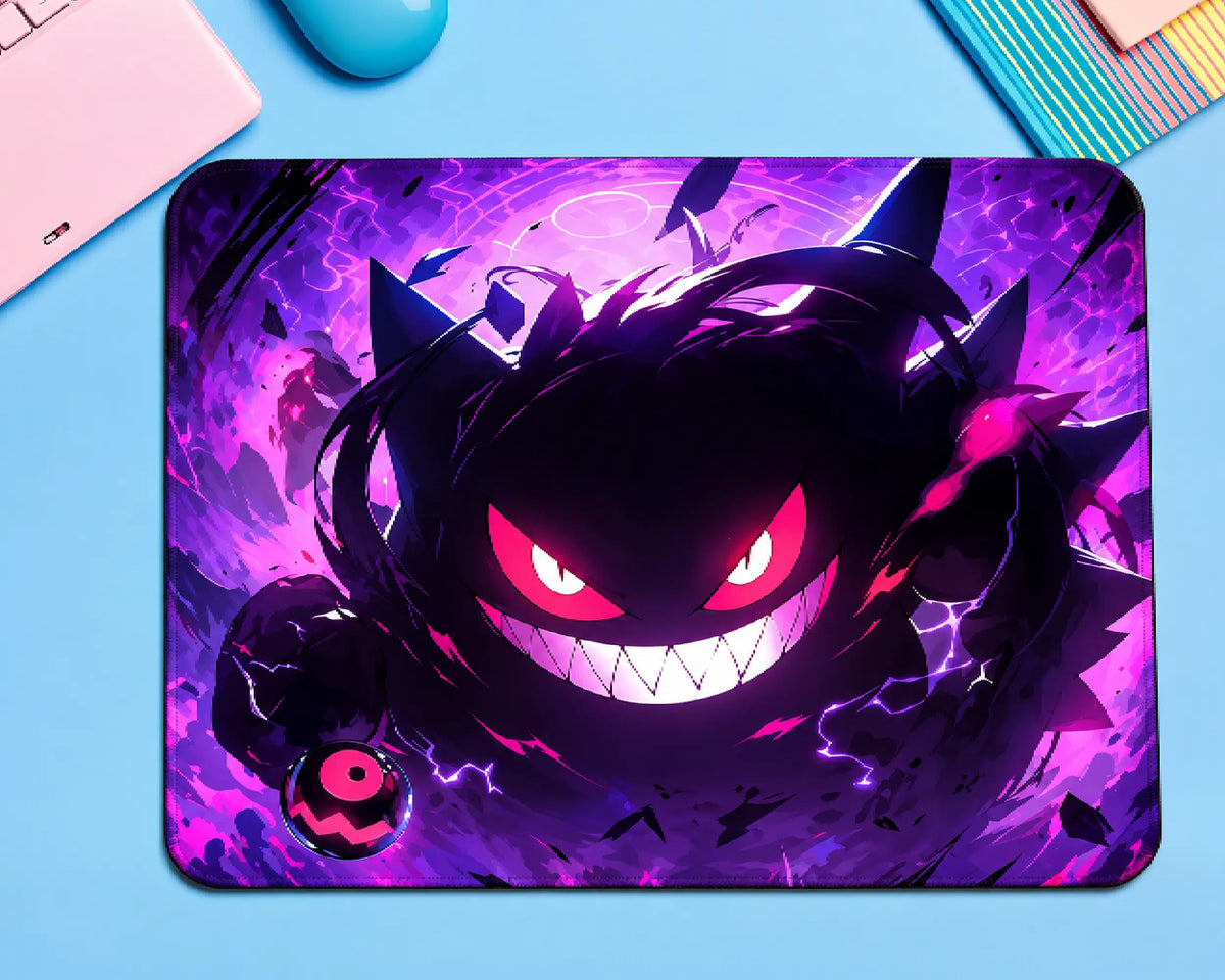 Gengar Pokémon gaming mouse pad featuring a fierce dark-purple ghost with glowing pink eyes, a sharp white grin, and vibrant violet and magenta energy effects.