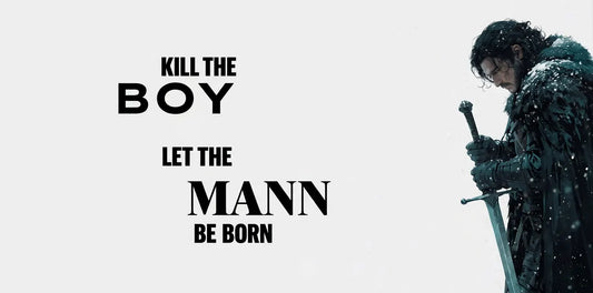 Close-up fantasy swordsman in snow with ‘Kill the boy let the man be born’ quote, minimalist white desk mat design.