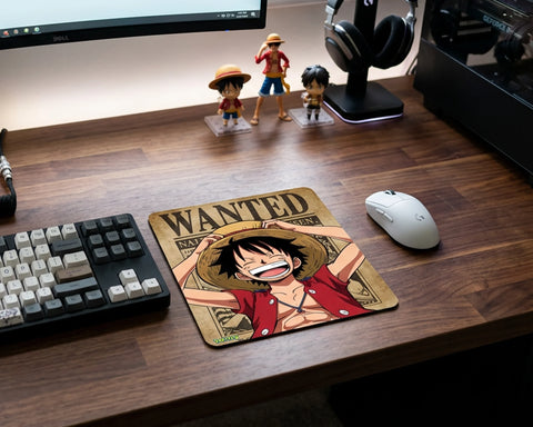 One Piece Monkey D. Luffy wanted poster anime mouse pad on wooden gaming desk with keyboard and anime figures
