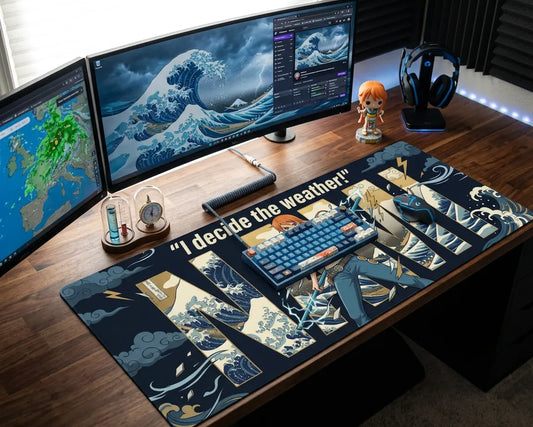One Piece Nami mouse pad on modern gaming desk with dual monitors, mechanical keyboard, and anime figure, featuring storm and ocean wave design.