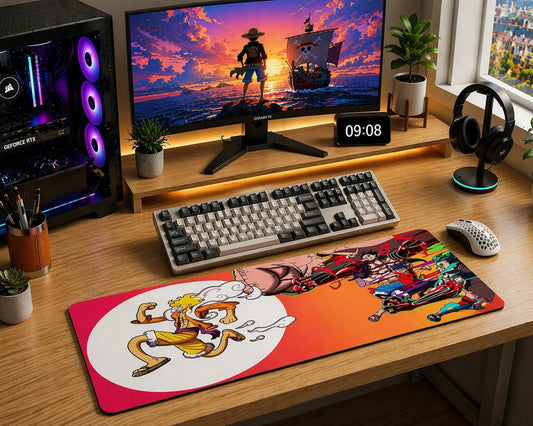 Anime gaming desk setup with One Piece mouse pad featuring Gear 5 Luffy, mechanical keyboard, RGB PC, and modern wooden workspace