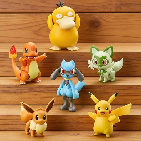 Set of six colorful cartoon character figurines on a wooden surface