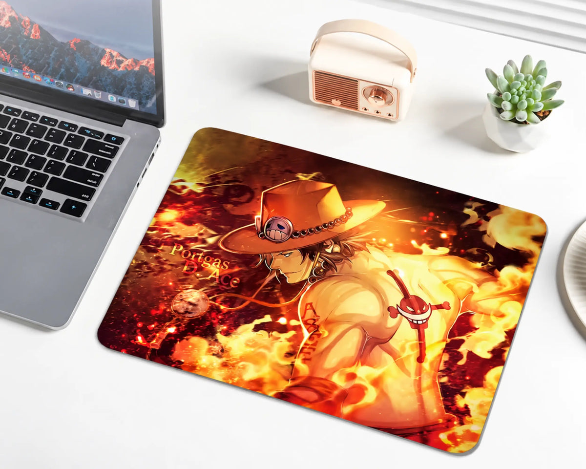 Portgas D. Ace from One Piece wearing an orange cowboy hat with a skull emblem, surrounded by glowing orange and yellow flames, fiery embers, and a dark red background on an anime gaming mouse pad.