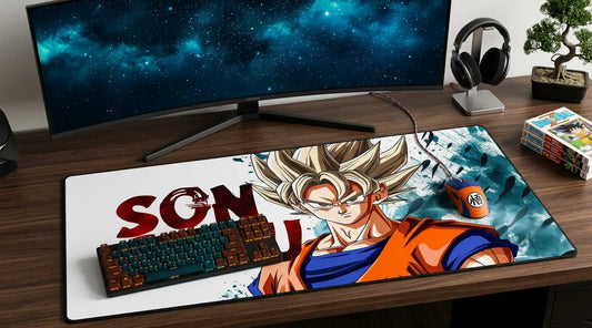 Modern desk with ultrawide curved monitor and Son Goku anime desk mat. Keyboard, mouse, headphones, and minimal decor create a clean look.