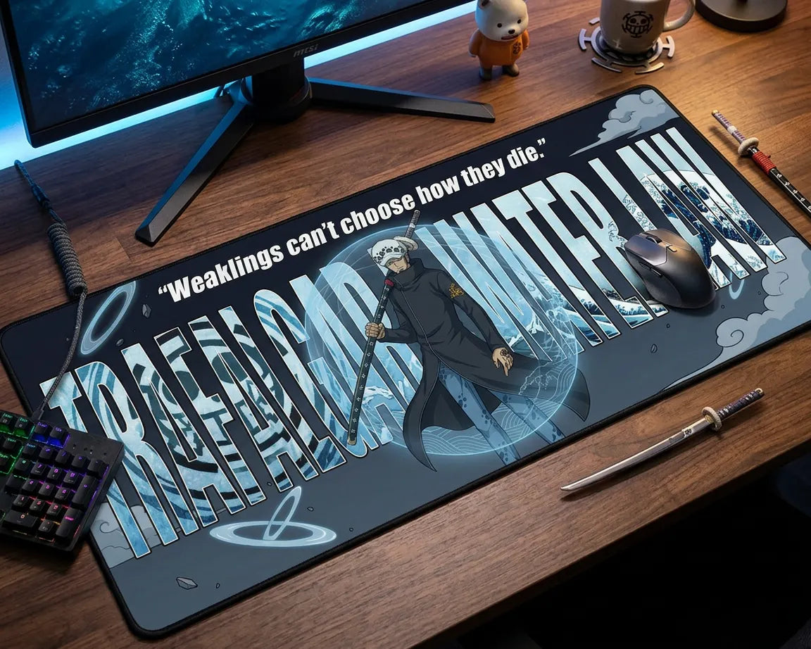 Trafalgar Law anime mouse pad on wooden desk with mechanical keyboard and mouse, featuring icy blue design and character quote.
