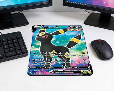 Anime style Umbreon V gaming mouse pad with vibrant blue and pink background on modern white desktop setup