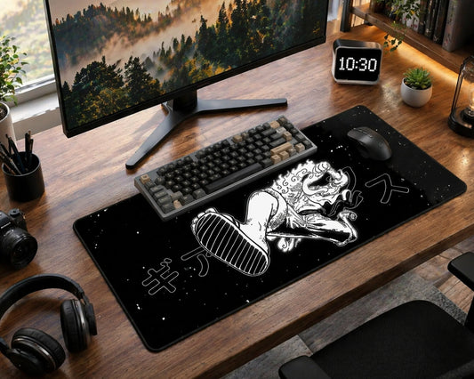 Extended black anime desk mat with white Luffy illustration, wireless mouse, modern desk setup, and ambient lighting for gaming workspace.