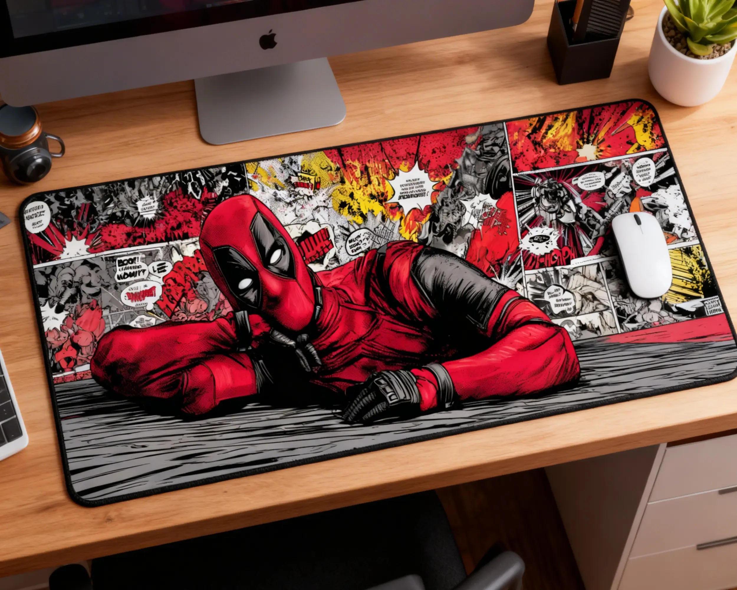 extended deadpool desk mat featuring comic style artwork on modern dark workspace with keyboard and mouse