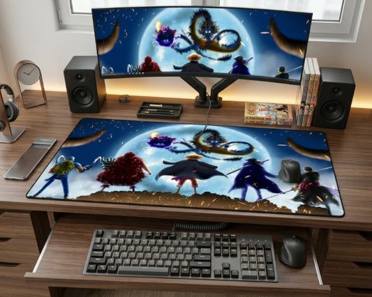Clean anime-inspired gaming desk with ultrawide monitor, matching large desk mat, speakers, headphones, figurines, and wooden desktop