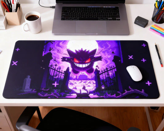 large gengar mouse pad under laptop with mouse coffee and office setup spooky purple theme