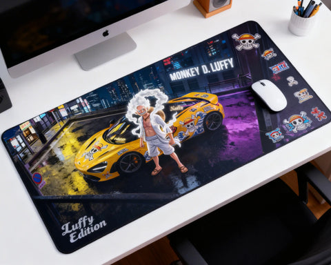 wide desk mat with monkey d luffy one piece artwork and anime car design in modern workspace setup