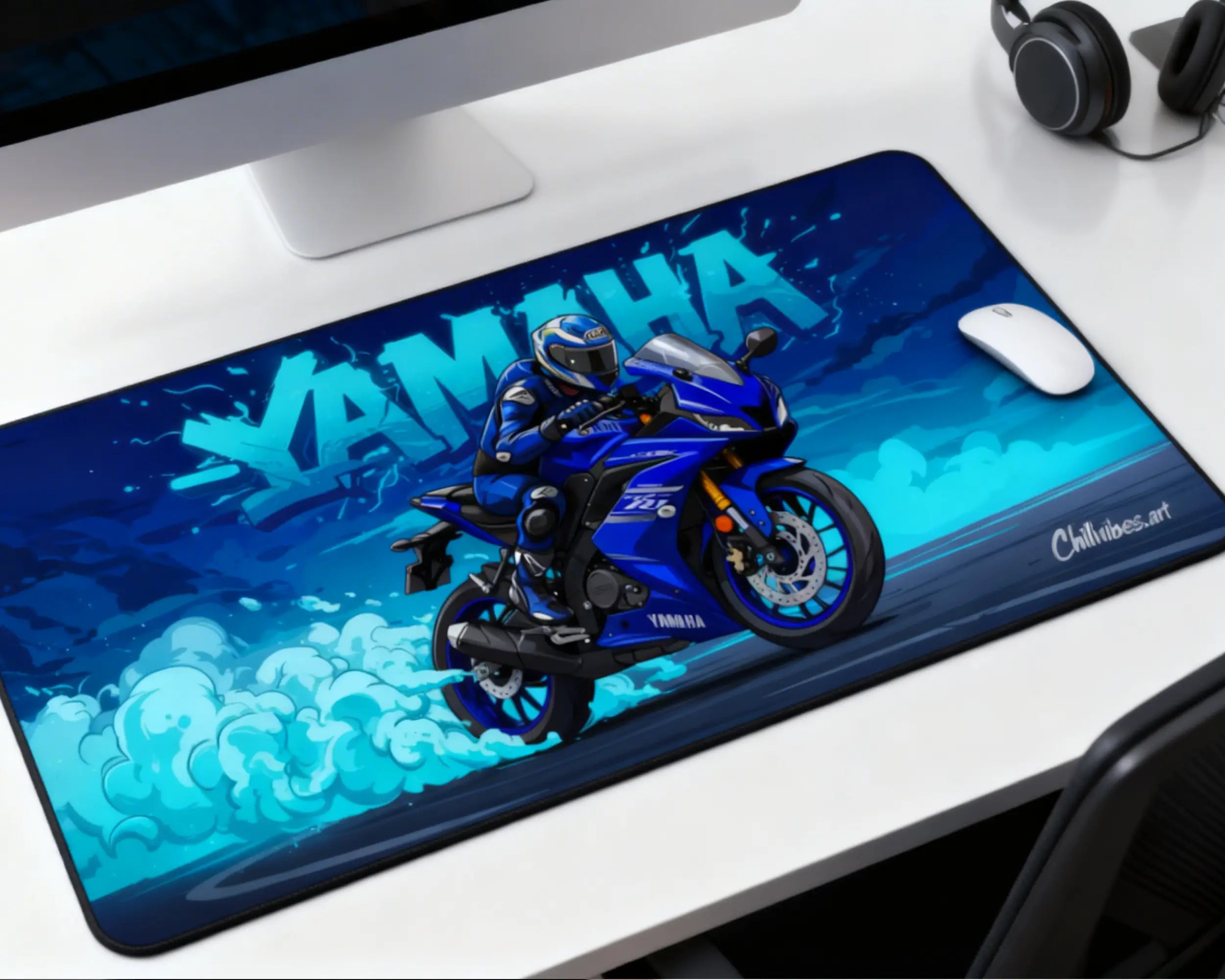 yamaha motorcycle gaming mouse pad with blue sport bike design on modern white desk with mouse and monitor